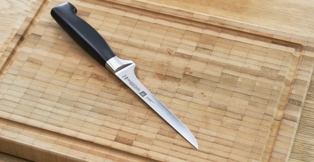 Zwilling Uitbeenmes Four Star 14 cm Discount